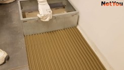 NetYou III - un dispositivo per l'applicazione rapida e uniforme della colla sul pavimento