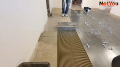 NetYou VII - un dispositivo per l'applicazione rapida e uniforme della colla sul pavimento