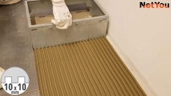 NetYou I - Device for fast and equal application of adhesive on the floor