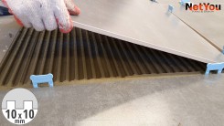 NetYou I - Device for fast and equal application of adhesive on the floor